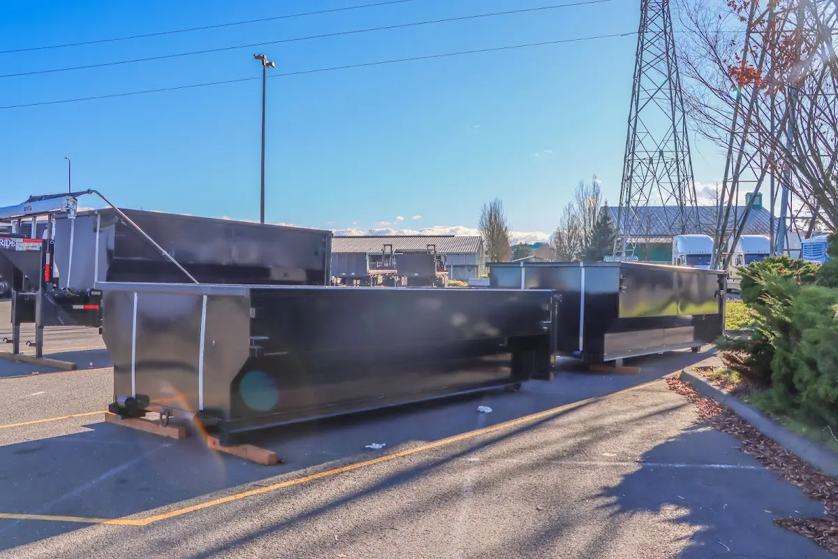 Roll-off dumpster ready for waste disposal at job site for Construction Dumpster Rental in Marlene Village